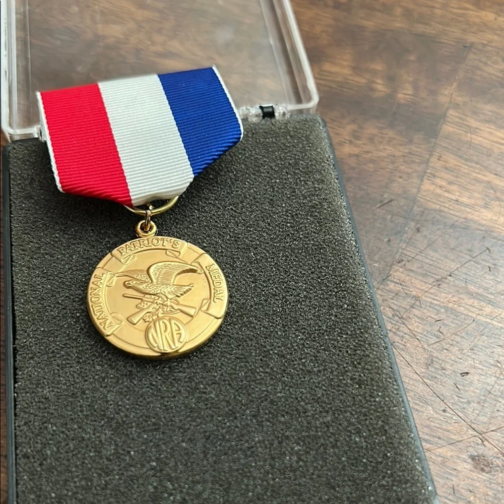 Gold Medal with Red, White, and Blue Ribbon Natinal Patriots Medal